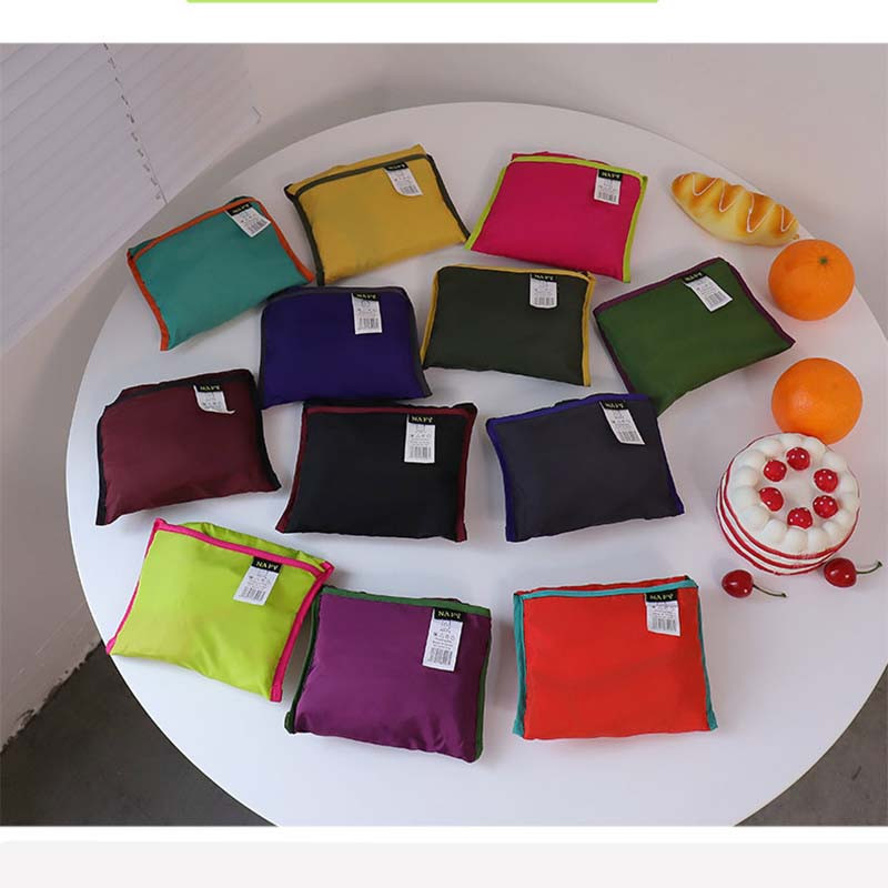 Lielas ietilpības atkārtoti lietojams pārtikas preču maisiņš, saliekams iepirkumu maisiņš, sadursmes krāsas aukliņu soma Ceļojumu modes kabatas organizators