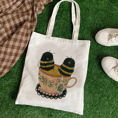 Vászon hordtáska vásárlói táska Női tervezői kézitáskák 2021-es divat lányok alkalmi nagy kapacitású, aranyos méhnyomat válltáskák