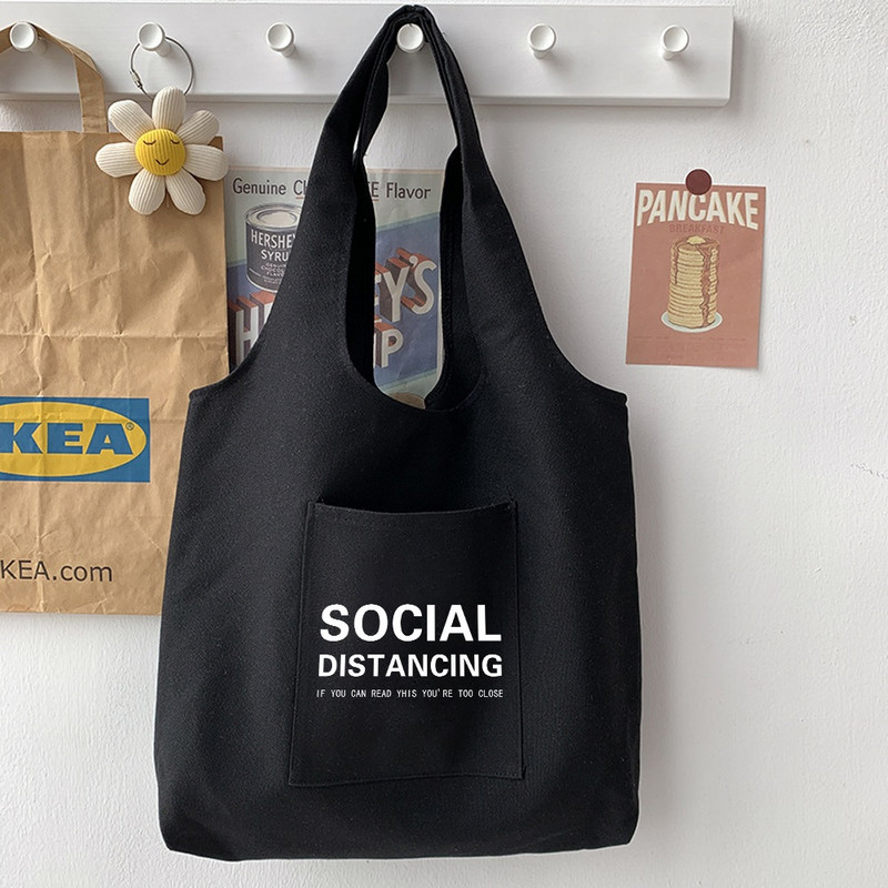 2022 Geantă pentru navetiști Geanta de umăr Harajuku Geantă de femeie Geantă de tote ocazională Geanta de mână pentru cumpărături Geanta de pânză imprimată cu model text simplu, negru