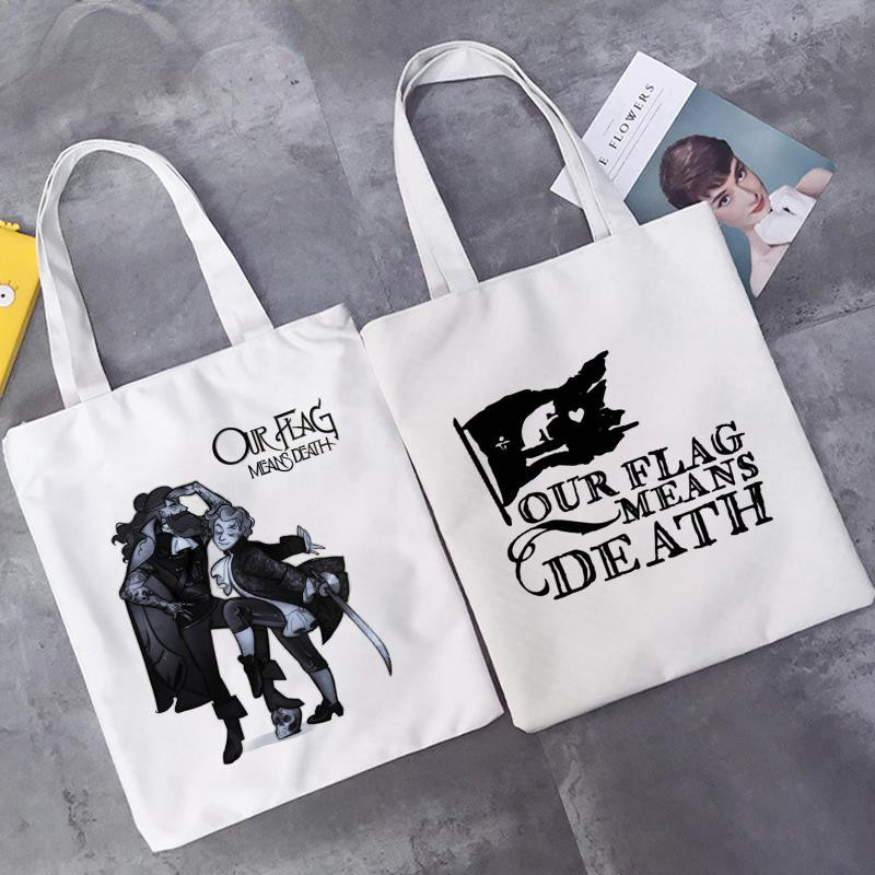 Naša zastava znači Death Cat Flag Ženske velike ručne torbe Platnena torba Estetika Torba za plažu Torbe za kupovinu Elegantne torbe za kupovinu preko ramena