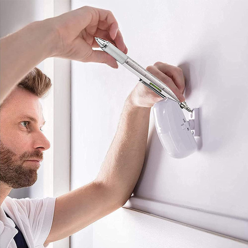 7 vienā daudzfunkcionāla lodīšu pildspalva ar modernu rokas instrumentu. Mēra tehniskais lineāls Skrūvgriezis Skārienekrāna irbulis līmeņrādis