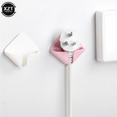 Radošs sienas kontaktligzdas āķis bez izsekojamības lipīga āķa stieples turētājs Uzglabāšana virtuves guļamistabas statīvs, 2 iepakojumi