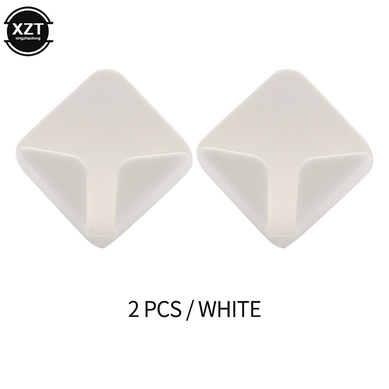 Radošs sienas kontaktligzdas āķis bez izsekojamības lipīga āķa stieples turētājs Uzglabāšana virtuves guļamistabas statīvs, 2 iepakojumi