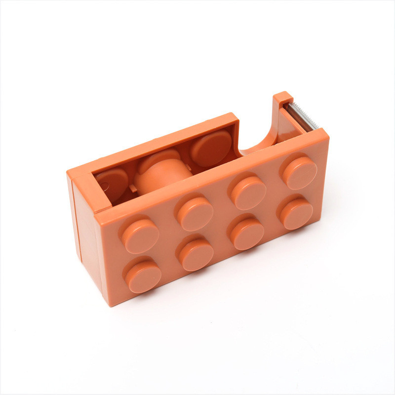 Kūrybinis popieriaus juostos pjaustytuvas Biuro statybinio bloko formos raštinės reikmenys Maskavimo juostos laikiklis dozatorius Washi juostos laikymo biuro įrankiai