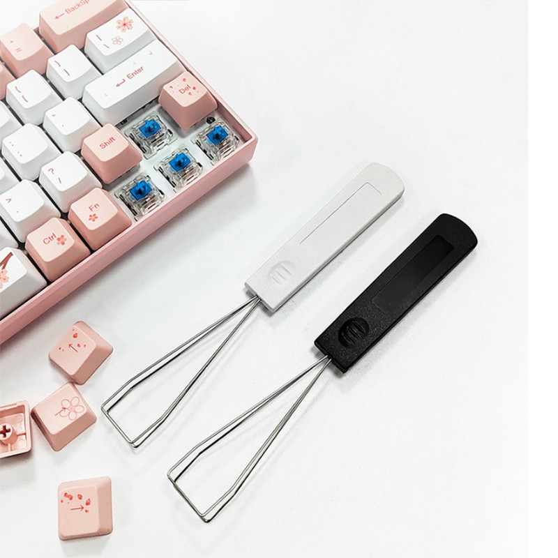 Universalus klaviatūros klavišų dangtelio ištraukiklis, skirtas mechaniniam klaviatūros dangtelio nuėmimo raktui