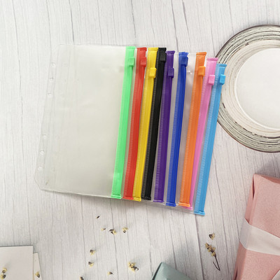 A6 iesiešanas kabatas Rāvējslēdzējs Ērtas caurspīdīgas krāsas PVC mapes 6 gredzenu piezīmjdatora iesiešanas datnes Ziņojumi Iesiešanas maisiņi Biroja piederumi