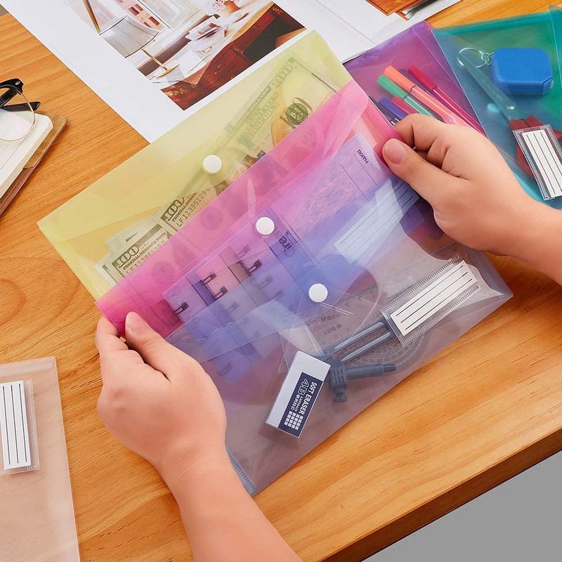 5 pakki A6 läbipaistvad ümbrikud, failikaust arvekott, silditaskuga pliiatsitasku, A6 ümbriku failikott koolikontori koduseks kasutamiseks