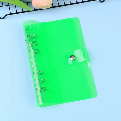 A7 izmēra caurspīdīgs, mīksts PVC 6 gredzenu iesiešanas piezīmjdatora vāks ar spiedpogas aizdari žurnālu plānotājam biroja kancelejas piederumiem