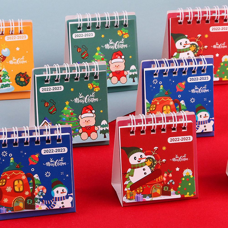 Patrauklus trikampis laikiklis dvigubos ritės dizainas, kompaktiškas, stovimas 2023 m. stalinis kalendorius, ornamentas stalinis kalendorius, įrašymo data