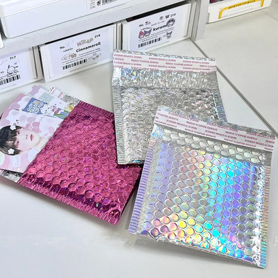 20 kom/lot Laser Bubble Mailer Reciklirajte srebrne aluminijske laminirane folije otporne na udarce Papir s mjehurićima za pakiranje kartice visoke kvalitete