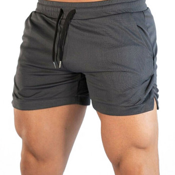 Най-новите мъжки едноцветни къси панталони със средна талия Фитнес тренировки за бягане Еластични шнурове Диви ежедневни летни спортни шорти
