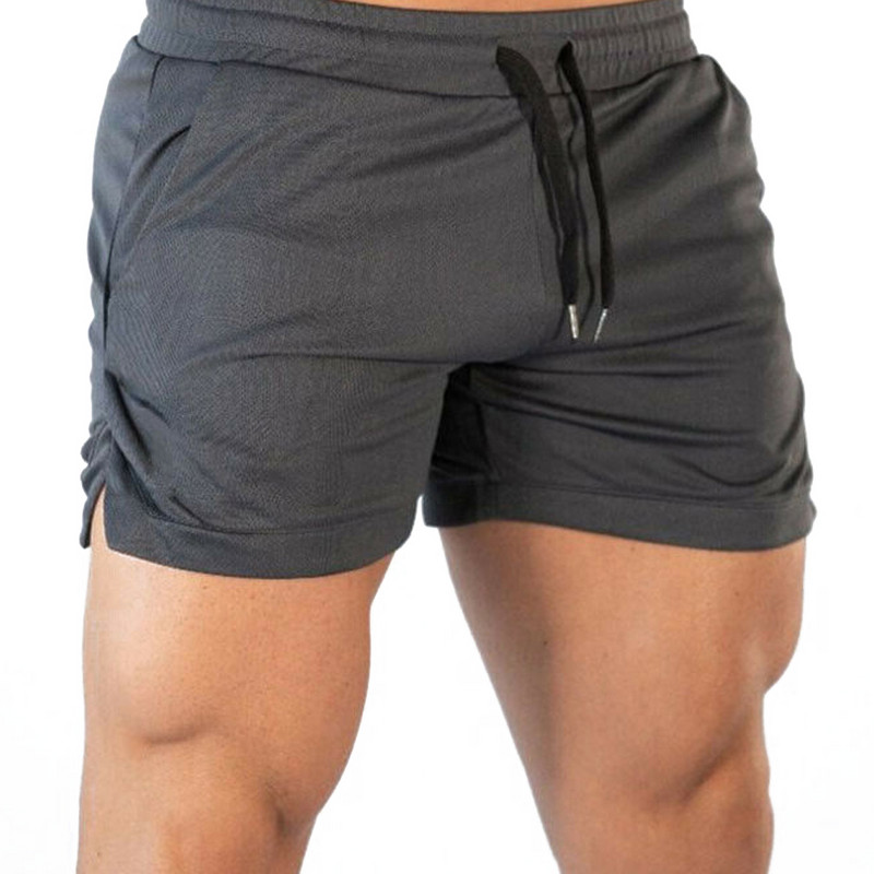 Legújabb férfi egyszínű rövidnadrág derékközép Fitnesz edzés Futás Elasztikus húzózsinór Vad hétköznapi nyári sportruházat rövidnadrág