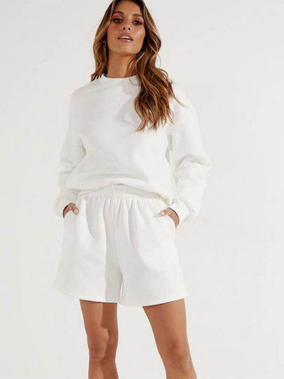 Naiste vabaaja spordipüksid Ühevärvilised elastse vöökohaga laia säärega lühikesed püksid, millel on kaldus taskud Naiste spordidressi treeningpüksid