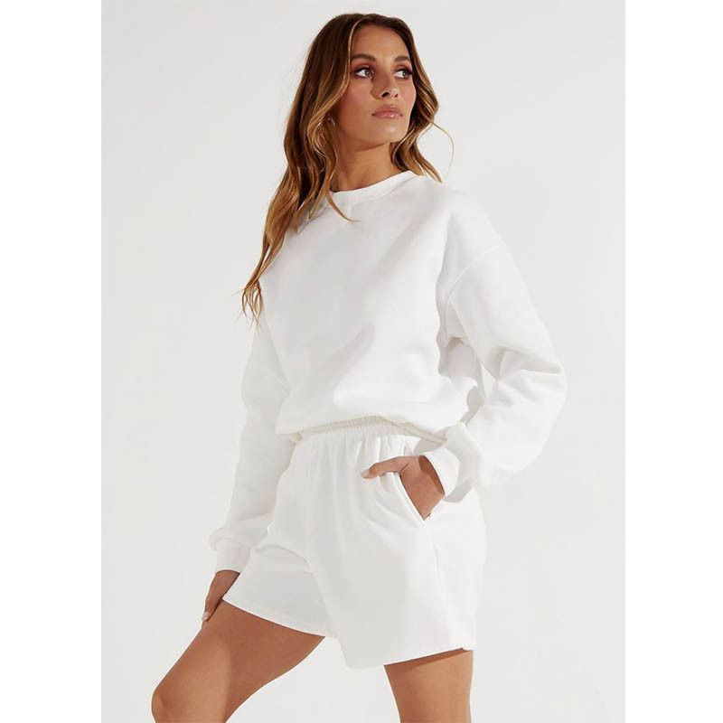 Naiste vabaaja spordipüksid Ühevärvilised elastse vöökohaga laia säärega lühikesed püksid, millel on kaldus taskud Naiste spordidressi treeningpüksid