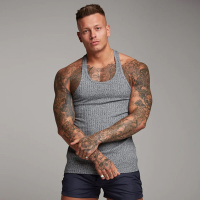 Muški prsluk Nova ljetna brzosušeća rastezljiva odjeća za fitness Trening za trčanje u teretani Tanka modna sportska odjeća s okomitim prugama bez rukava