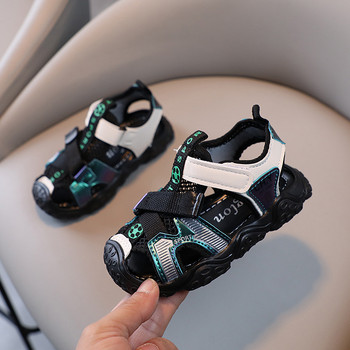2023 Κλασικά μαύρα γκρι σανδάλια για αγόρια κομμένα καλοκαιρινά αθλητικά παπούτσια Παιδικό υπαίθριο κήπο Όμορφα παιδικά παπούτσια για αγοράκι G04171