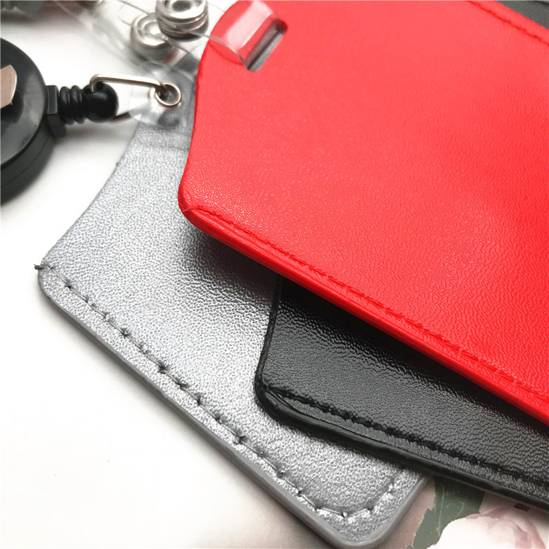 1 rinkinys Verslo ištraukiamo ženklelio ritės ištraukiamas asmens tapatybės kortelės ženklelio laikiklis.