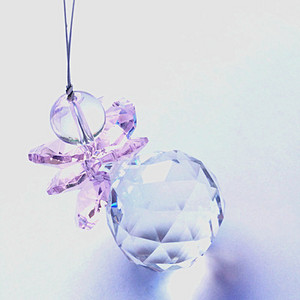 Puikūs krištoliniai saulės gaudyklės stikliniai aštuonkampiai karoliukai su sietyno rutuliu, skirti apšviesti Kalėdų eglutės kabantį vestuvių dekorą