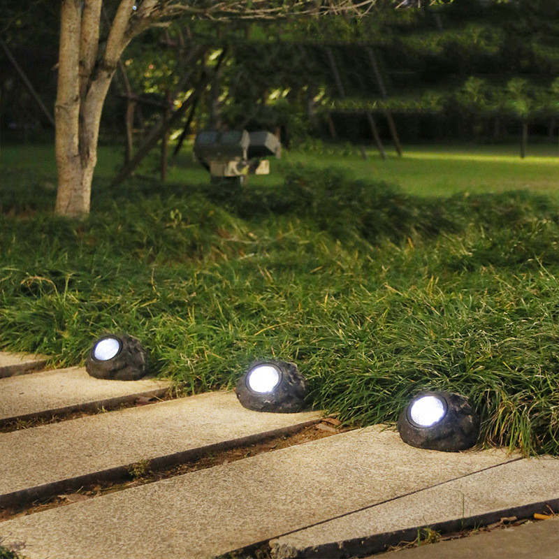 4LED-i välistingimustes kasutatavad päikeseenergia prožektorid Simulatsioon kivist päikeseenergia aiavalgustid päikeseenergia LED-valgustid välimaastiku kaunistused murulambid