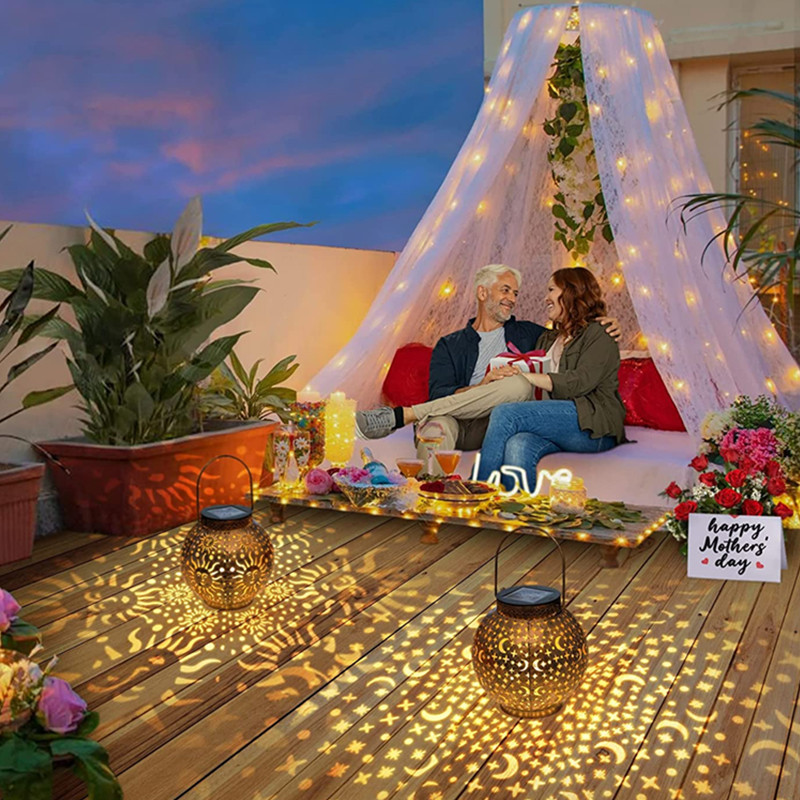 Neperšlampami saulės sodo žibintai lauke pakabinami metaliniai mėnulio žvaigždės projekciniai saulės žibintai, skirti vidaus kiemo takų dekoravimui