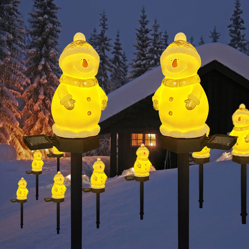 Saules Ziemassvētku dārza gaismas Ziemassvētku vecītis Sniegavīrs Ziemassvētku eglīšu dekors āra ūdensnecaurlaidīgs zāliena lampas pagalms Ielu celiņu parka apgaismojums