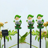 Rajzfilm napelemes gyepsétányi világítás Könnyű telepítés Dekoratív ösvény Táj lámpák Lengő intelligens érzékelő udvarhoz