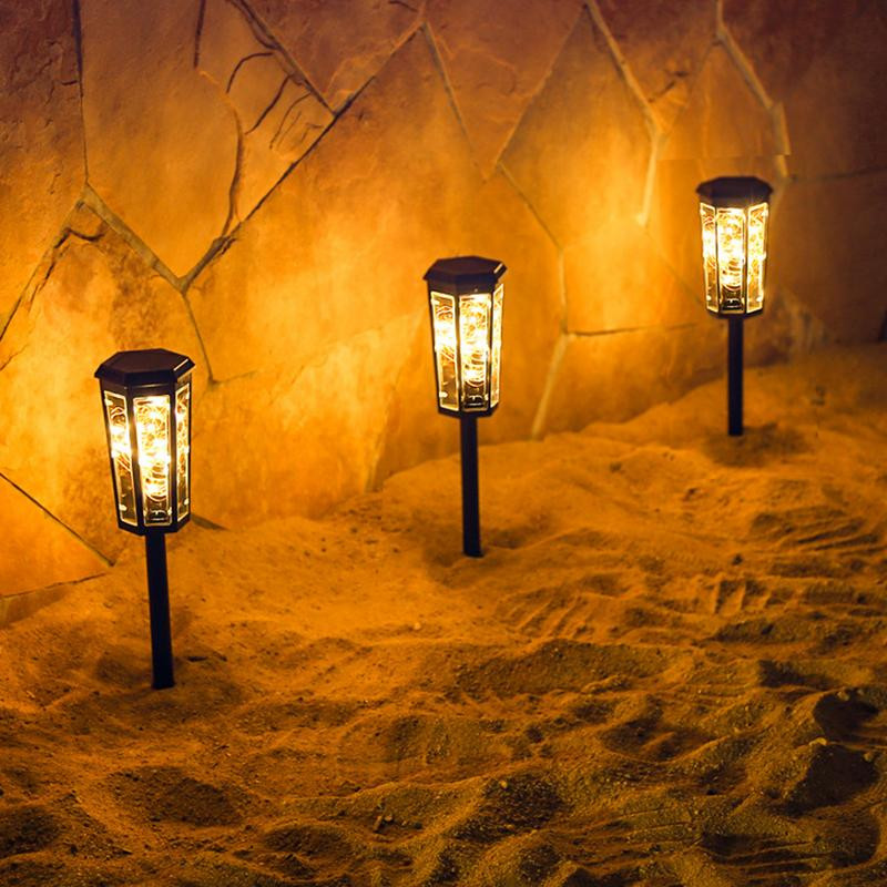 Ar saules enerģiju darbināma ceļa lampa āra apgaismojuma gaismas sensora gājēju celiņa lampa automātiskais apgaismojums ar saules enerģiju darbināms LED zāliena apgaismojums gājēju celiņam