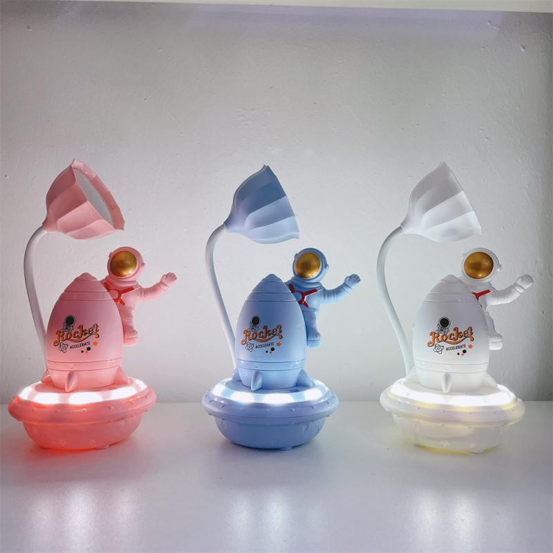 Uus multikas õpilaste LED, mis on ühendatud kahe õppiva magamistoaga voodi kõrval öövalgusti teise käiguga, astronauti ruumi kabiini laualamp