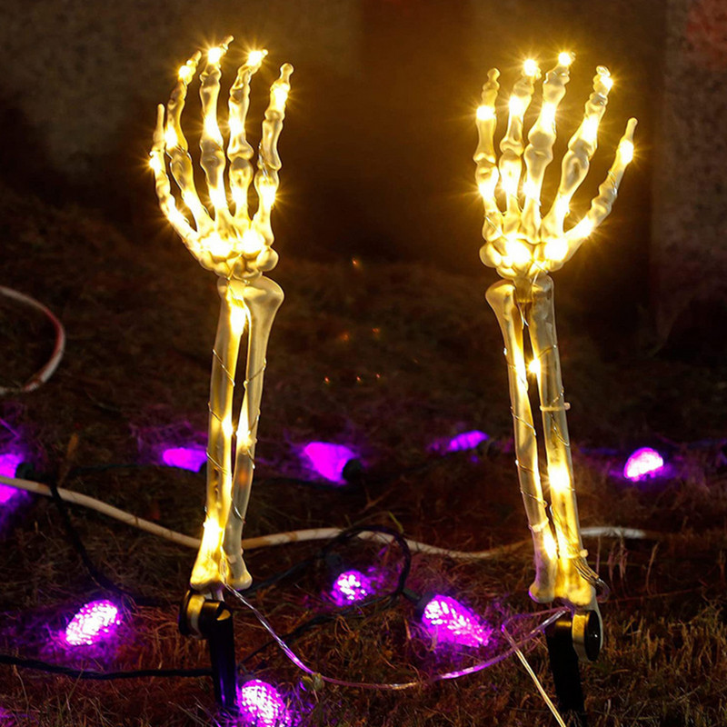 Halloween Light Up műanyag kézi elemmel működő/napenergiával működő 40 LED-es koponyakarok karókkal, fényfüzérekkel Ünnepi parti dekoráció