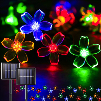Saules ziedu/zvaigžņu virkne āra gaismas 60 LED saules ķiršu ziedu ūdensnecaurlaidīga lampa dārza žogam pagalma koku svētku dekorēšanai