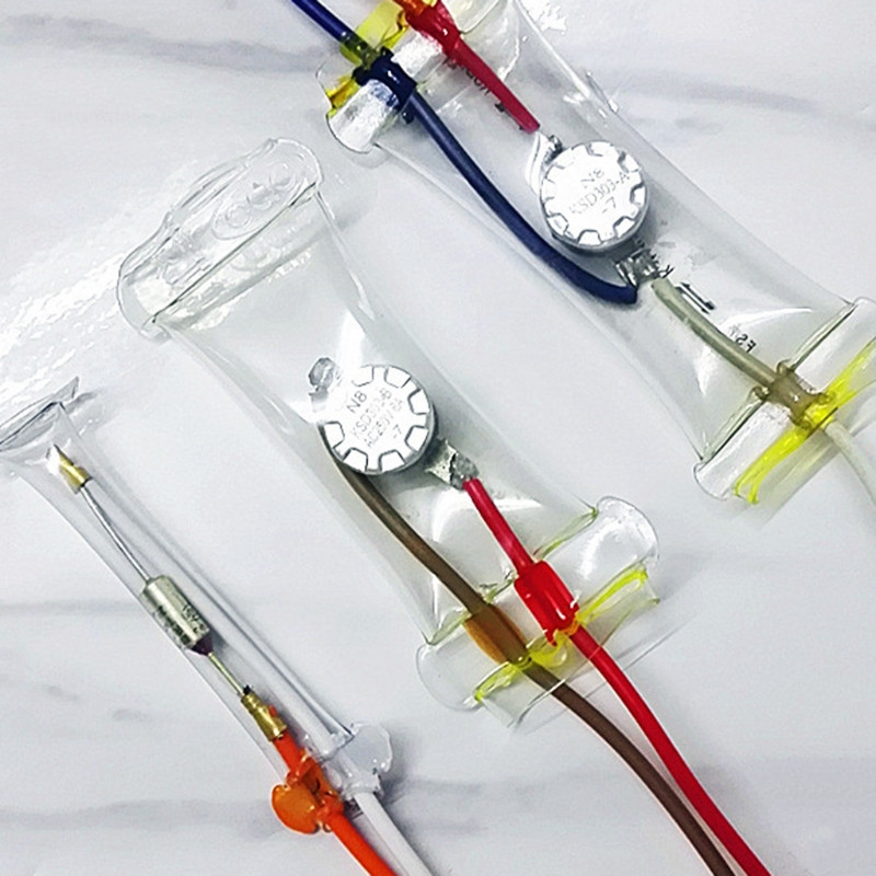 Šaldytuvo priedai Šiluminio saugiklio atitirpinimo jutiklis, skirtas šaldytuvams-šaldikliui, pakaitinis atitirpinimo temperatūros saugiklis