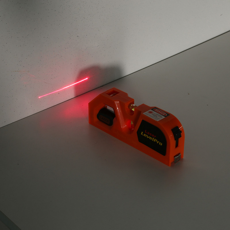 Mini infračervený laserový nivelátor Prenosný vysoko presný nivelačný merač s červeným lúčom Domáci laserový nivelátor na lepenie do zeme Merací nástroj