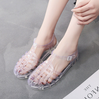 Sieviešu sandales Vasaras dobas sieviešu želejveida kurpes PVC mīkstas zempapēžu kurpes Sieviešu sandales Causal komforta sprādzes siksna Sieviešu apavi