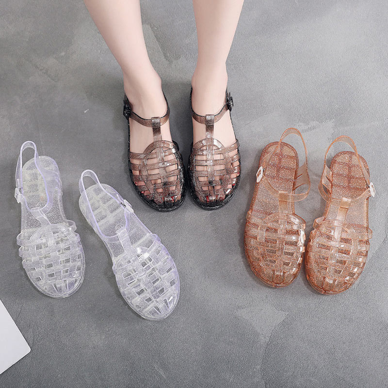 Sieviešu sandales Vasaras dobas sieviešu želejveida kurpes PVC mīkstas zempapēžu kurpes Sieviešu sandales Causal komforta sprādzes siksna Sieviešu apavi