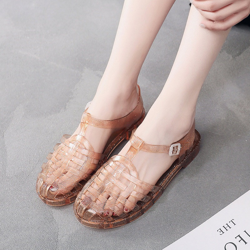 Sieviešu sandales Vasaras dobas sieviešu želejveida kurpes PVC mīkstas zempapēžu kurpes Sieviešu sandales Causal komforta sprādzes siksna Sieviešu apavi