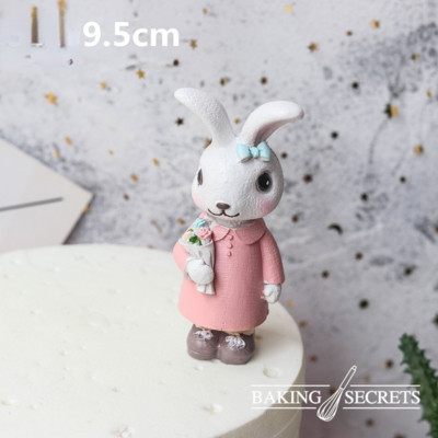 Lieldienu rozā zaķītis Daudz laimes dzimšanas dienā kūkas pildītāja Pirmā dzimšanas dienas ballīte Bērnu dušas rotājumi Zēns Meitene Trusīšu kūku cepšana