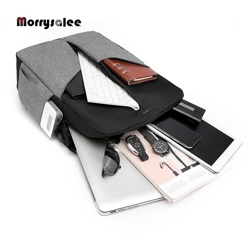 2022. g. Jaunas pretaizdzīšanas klēpjdatoru mugursomas Lielas ietilpības ceļojumu soma Vīriešu ūdensnecaurlaidīga uzlādes mugursoma Studentu somas USB uzlāde