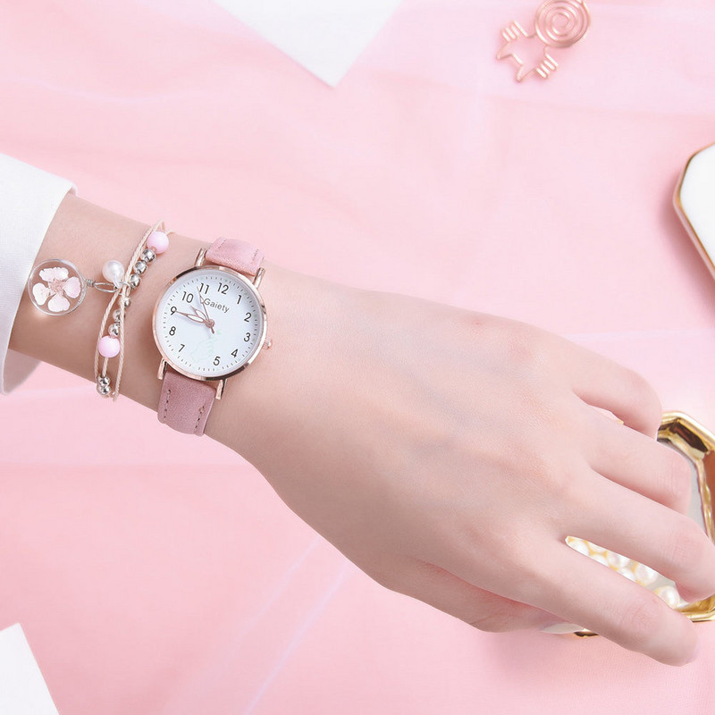 Modes pulksteņu rokassprādze Sieviešu jauns kvarca pulksteņu komplekts Meiteņu modes melnas jostas apaļais pulkstenis un rozā kulonu rokassprādze
