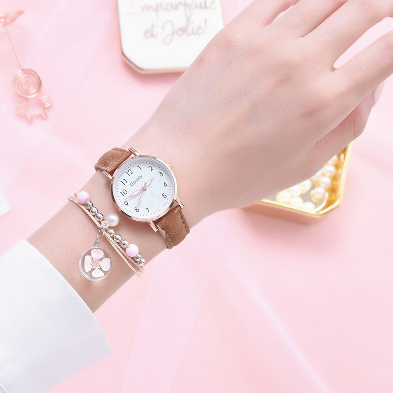 Modes pulksteņu rokassprādze Sieviešu jauns kvarca pulksteņu komplekts Meiteņu modes melnas jostas apaļais pulkstenis un rozā kulonu rokassprādze