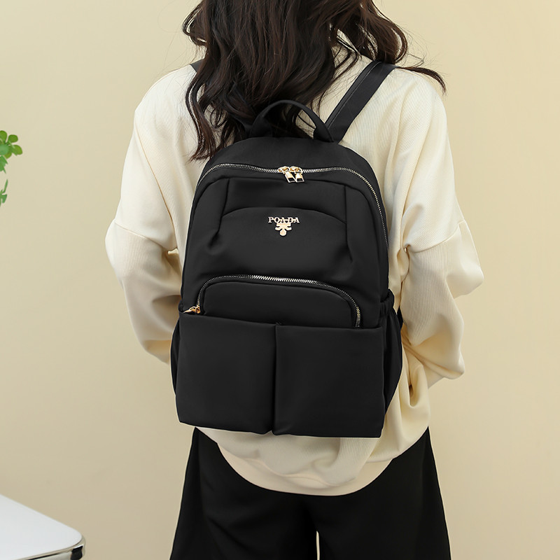 Ženski vodootporni najlonski ruksaci Modni svestrani ženski ruksaci Školske torbe Visokokvalitetni putni ruksak velikog kapaciteta