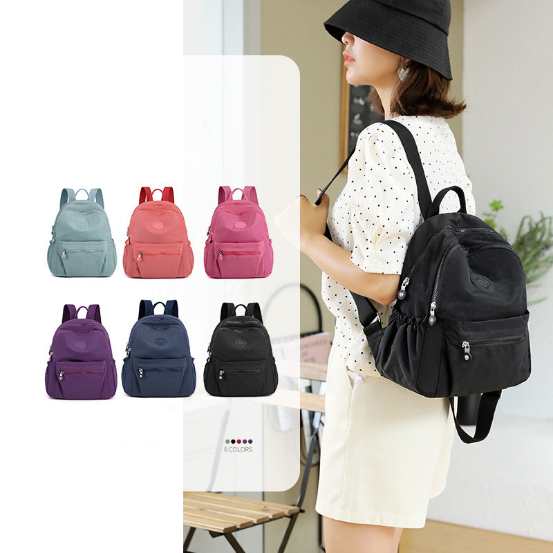 Nova modna lagana putna torba za 2022. Ruksak velikog kapaciteta Ženski jednostavan i svestran ruksak Školska torba Najlonski ruksak