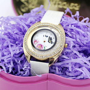 Shsby Νέο Δερμάτινο Χαλαζία Ρολόι χειρός Μόδα Rhinestone Rolling Beads Χρυσά Γυναικεία Ρολόγια Flower Butterfly Γυναικείο φόρεμα Ρολόι