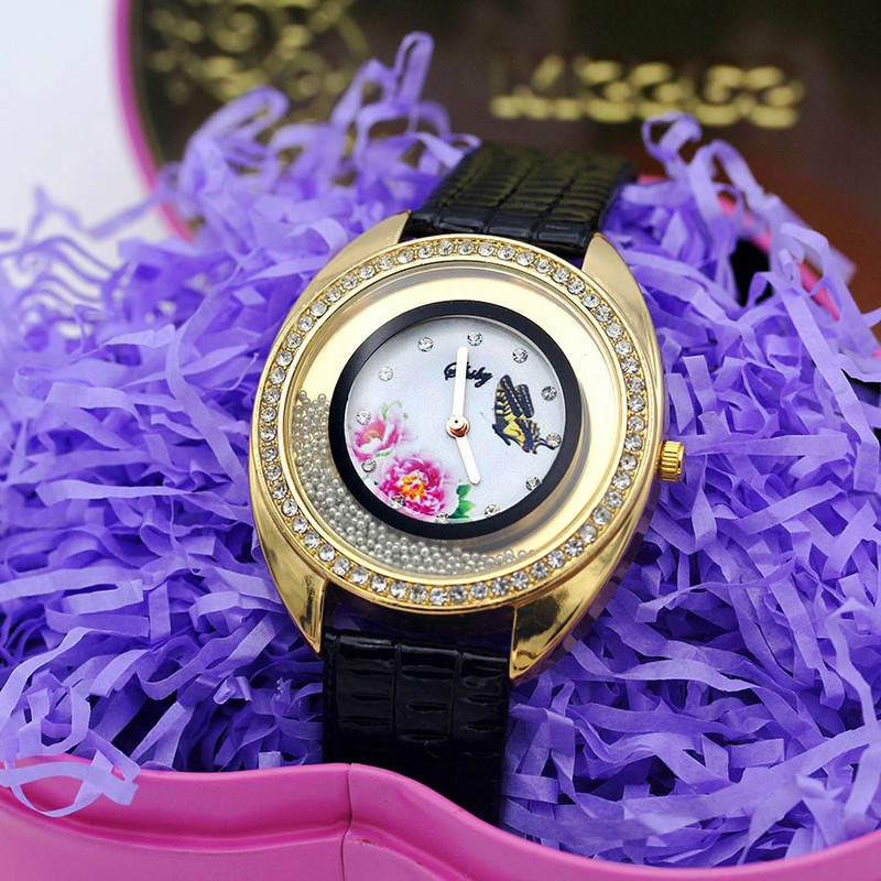 Shsby Νέο Δερμάτινο Χαλαζία Ρολόι χειρός Μόδα Rhinestone Rolling Beads Χρυσά Γυναικεία Ρολόγια Flower Butterfly Γυναικείο φόρεμα Ρολόι