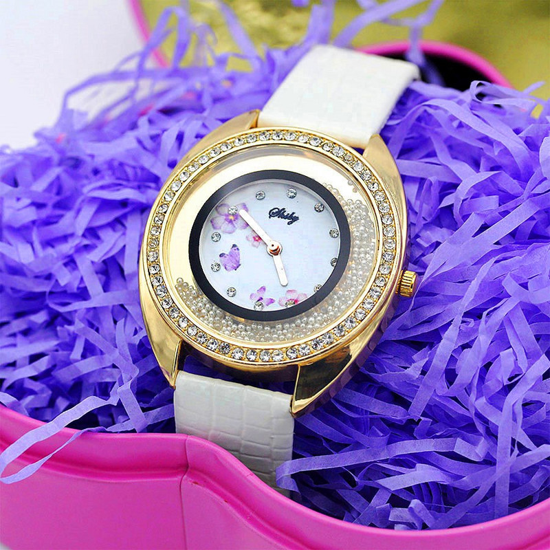 Shsby Νέο Δερμάτινο Χαλαζία Ρολόι χειρός Μόδα Rhinestone Rolling Beads Χρυσά Γυναικεία Ρολόγια Flower Butterfly Γυναικείο φόρεμα Ρολόι