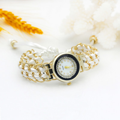 Χρυσό γυναικείο ρολόι φόρεμα Νέο γυναικείο λουλούδι πλεκτό ρολόι χειρός Χρώμα αστραφτερό ρολόι από ύφασμα στρας Γλυκό κοριτσίστικο ρολόι