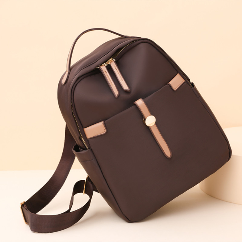 Vargusvastane ja vetthülgav nailonkangast seljakott Multifunktsionaalne suure mahutavusega koolikott Kuulus naiste disainiga seljakott