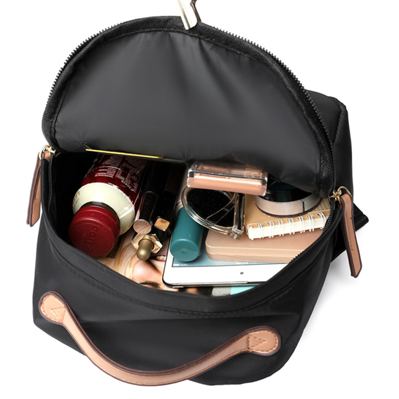 Vargusvastane ja vetthülgav nailonkangast seljakott Multifunktsionaalne suure mahutavusega koolikott Kuulus naiste disainiga seljakott