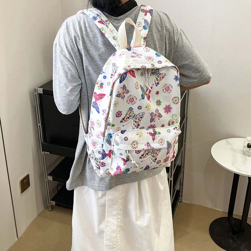 Iskolai hátizsák lányoknak tiniknek női hátizsák laptop hátizsák aranyos pillangós virágos hátizsák nylon nagy diákkönyvtáskák 2023
