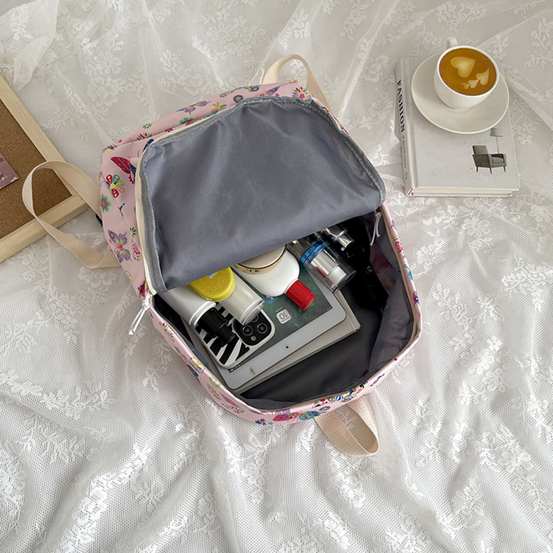 Iskolai hátizsák lányoknak tiniknek női hátizsák laptop hátizsák aranyos pillangós virágos hátizsák nylon nagy diákkönyvtáskák 2023