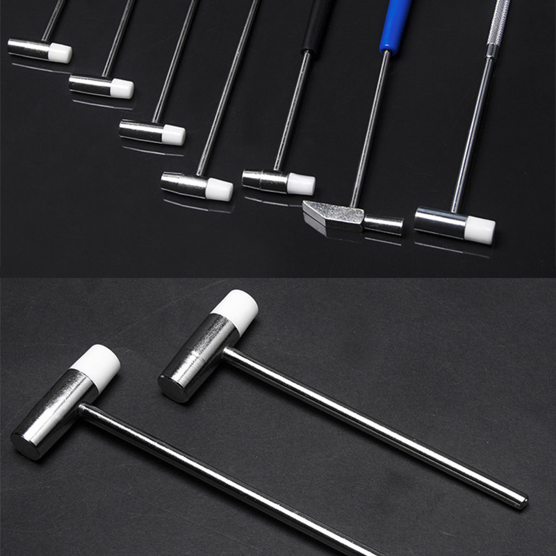 Kellatööriista haamer, metallist pehme ja kõva kaheotstarbeline kummipeaga vasar, kella hooldustööriist